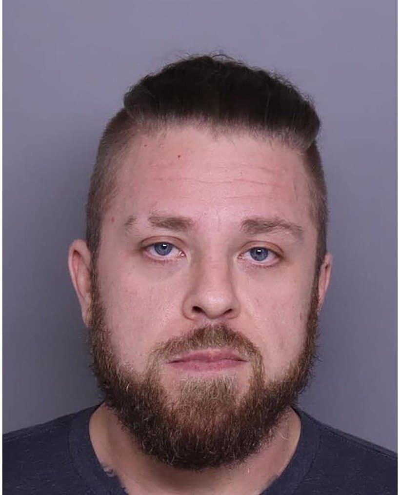 Booking photo of Christopher M. Carroll