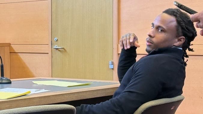 Douglas McFarlane seated in an Orange County courtroom