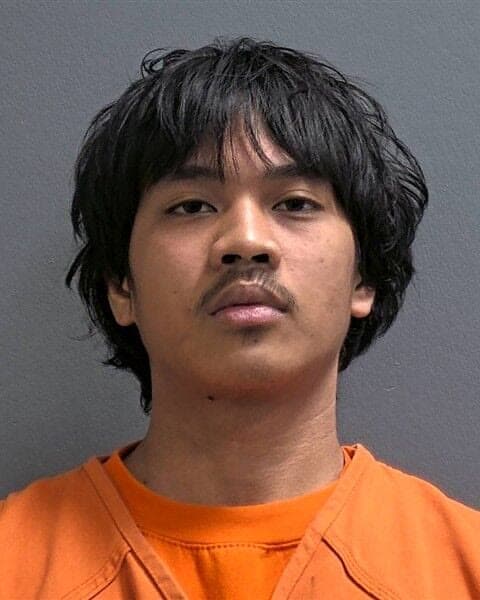 Booking photo of JK Athree