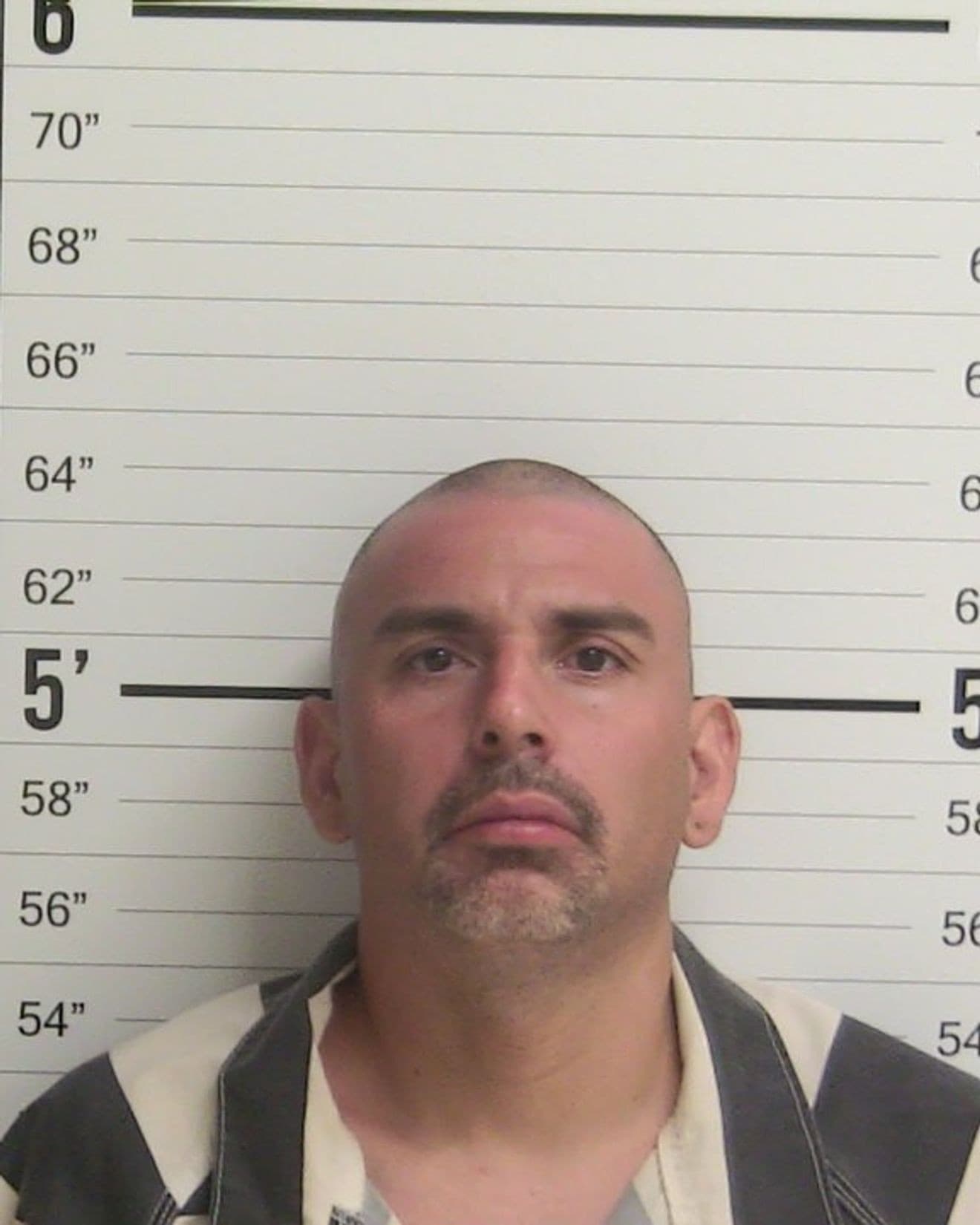 Booking photo of Jon Quezada