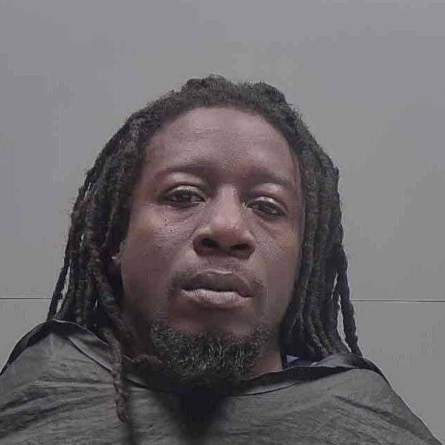 Booking photo of Malik Ansaar