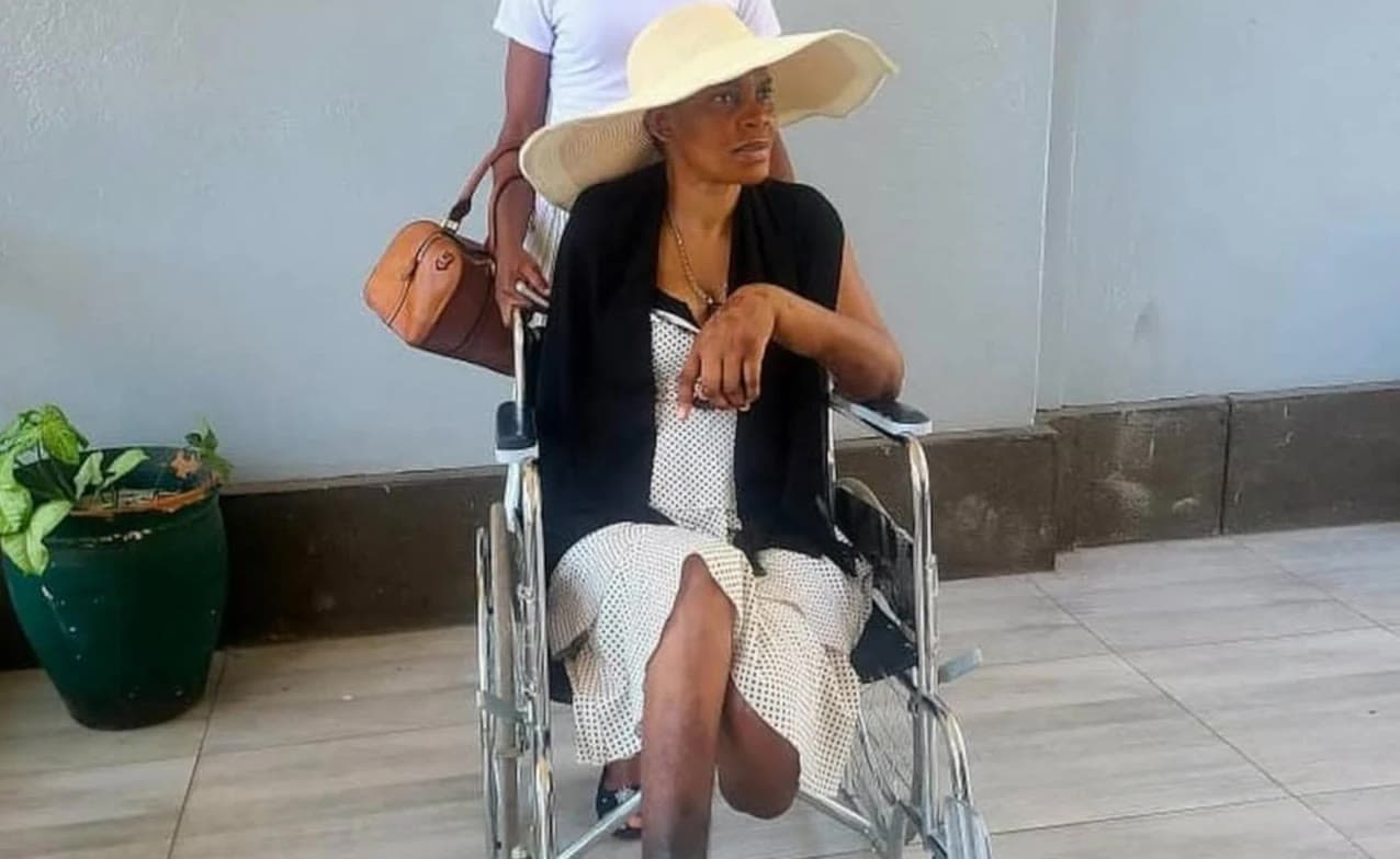 Marry Mubaiwa seated in a wheelchair