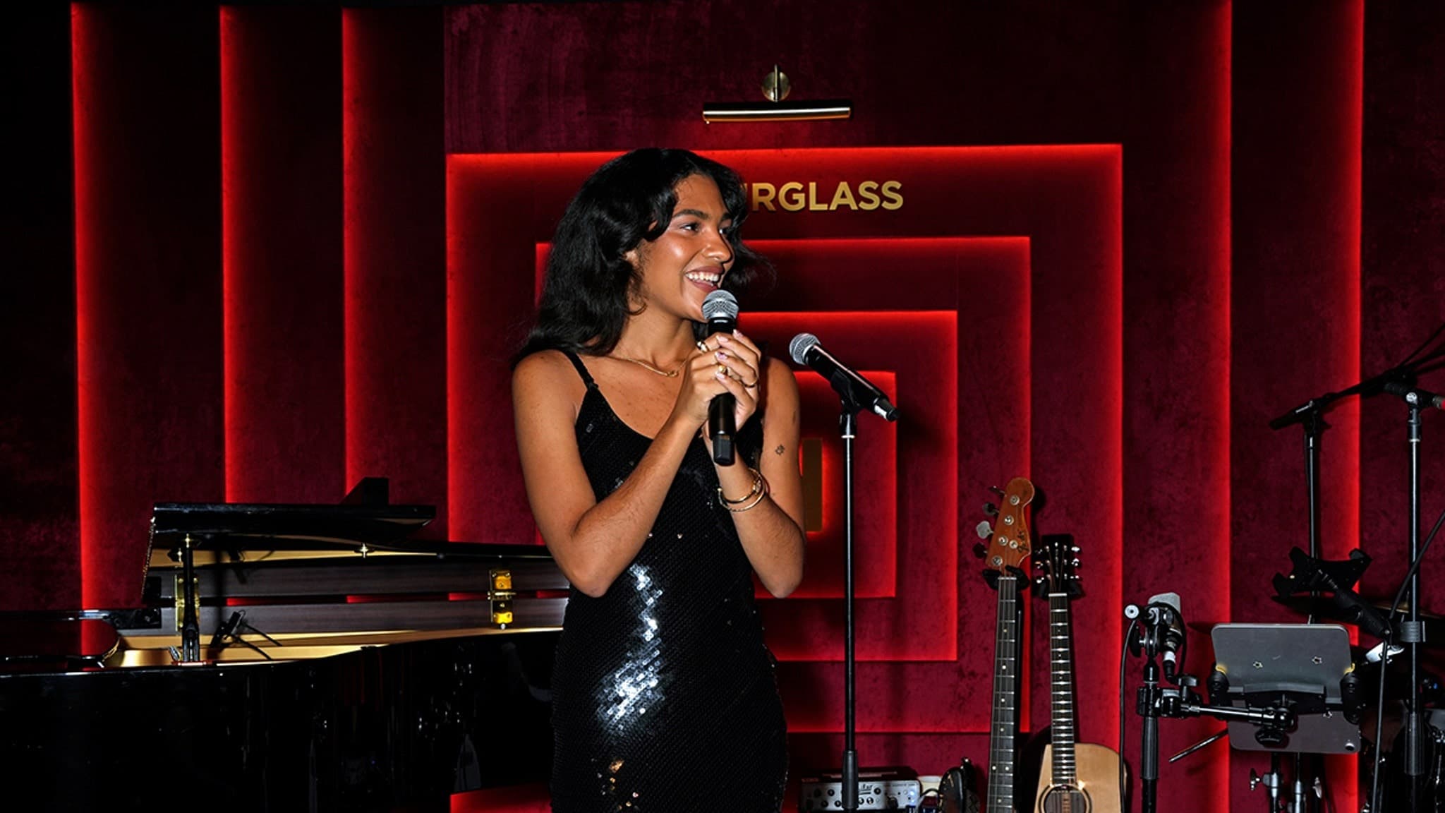 Photo of Olivia Dean performing