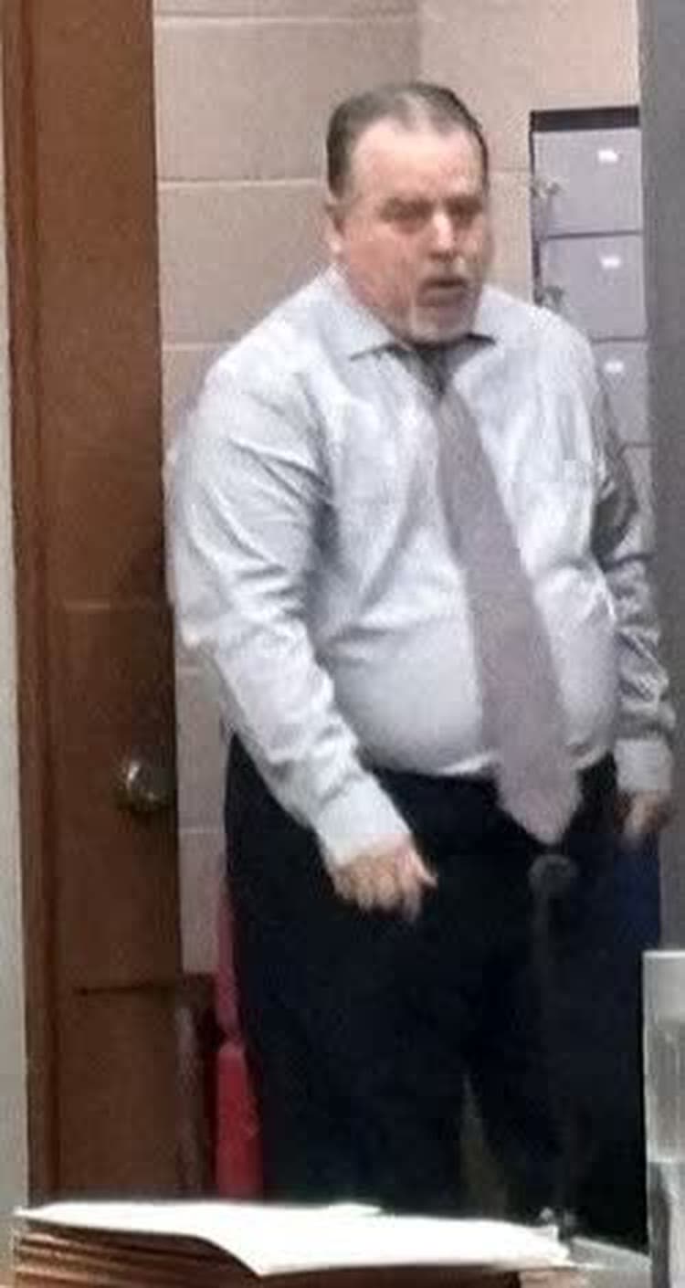 Sheridan Fogle enters the courtroom
